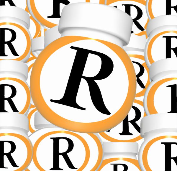 A registered trademark symbol superimposed over a background of dietary supplement bottles featuring branded ingredients.